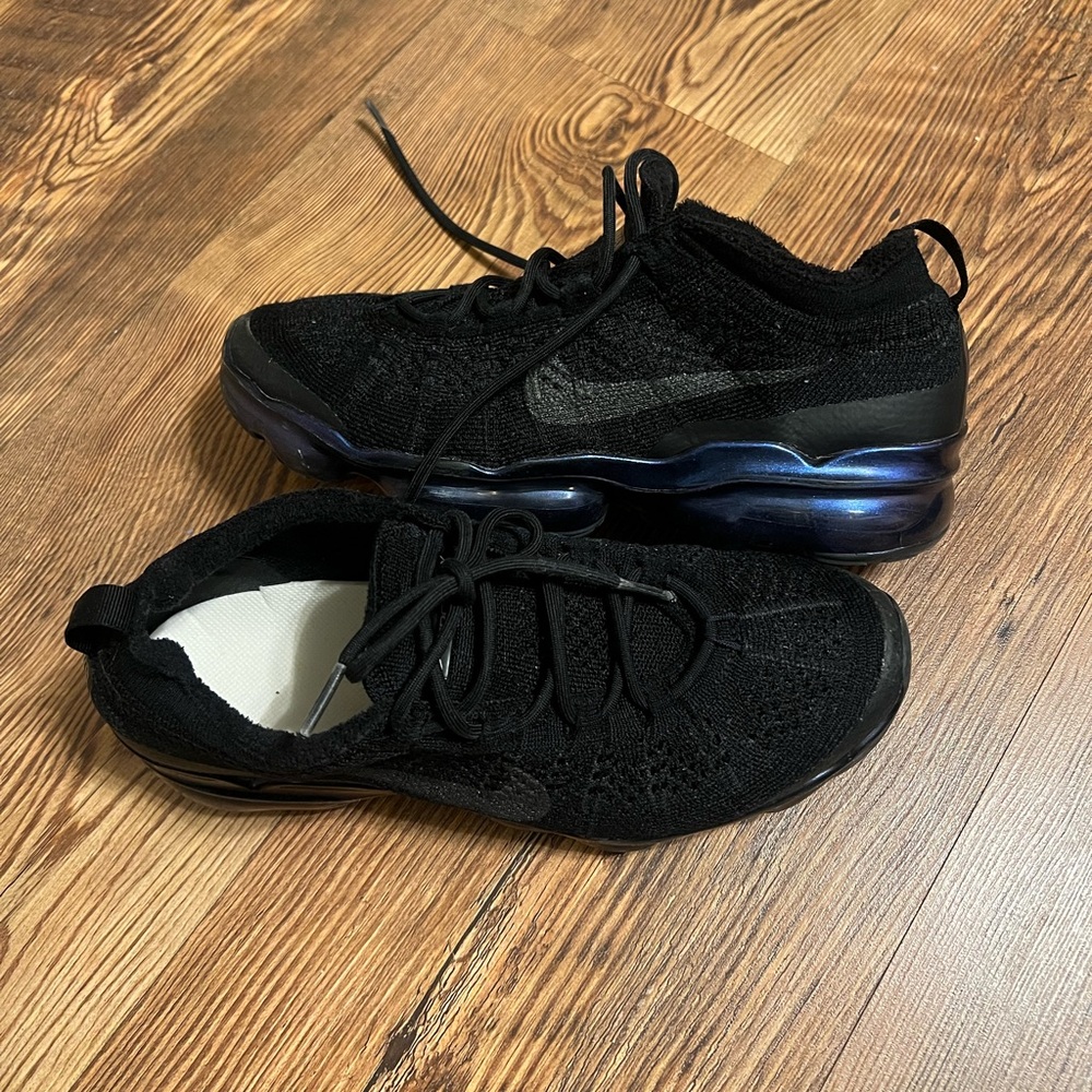 Nike Black Knit Sneakers with Blue Accents
